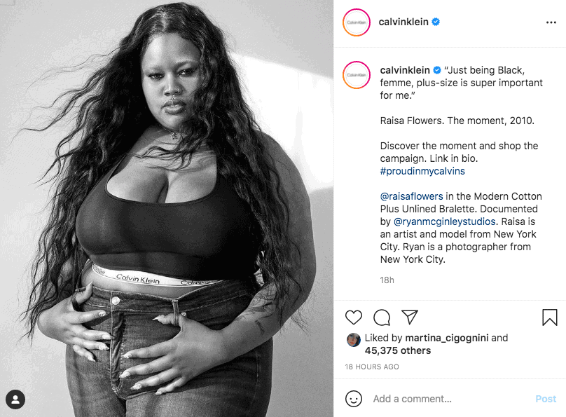 Plus sized black and white photo of a model posted by Calvin Klein